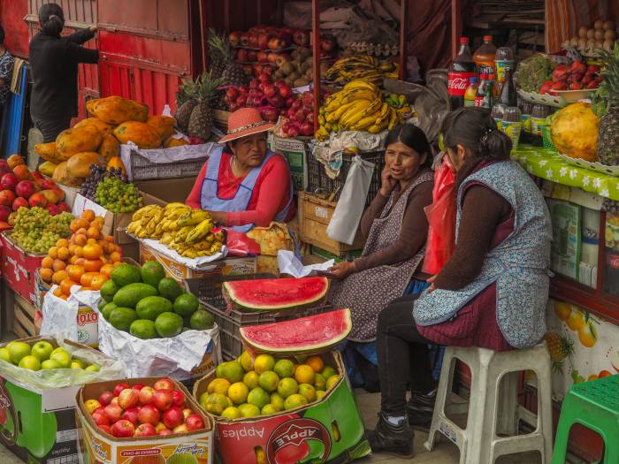 Three women in a market in La Paz, Bolivia
