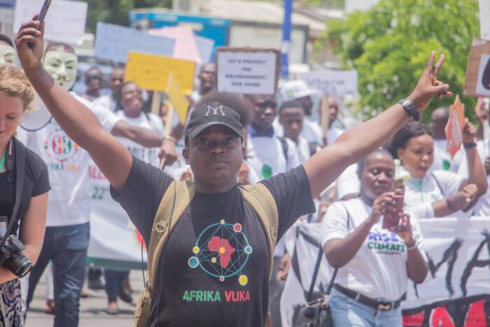 People march in Accra during the Africa Climate Week, in March 2019